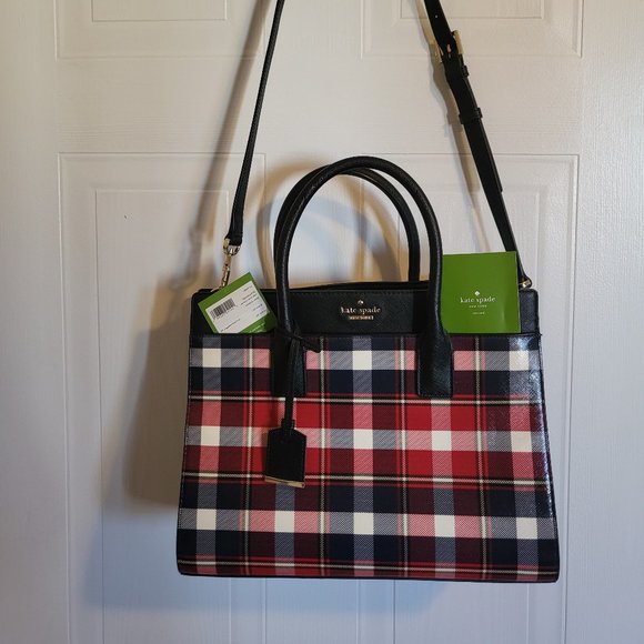 kate spade Handbags - Kate spade large plais purse with tags